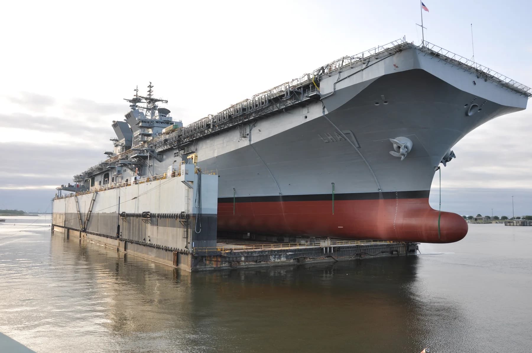 The amphibious assault ship USS Tripoli entering the water at the Pascagoula shipyard